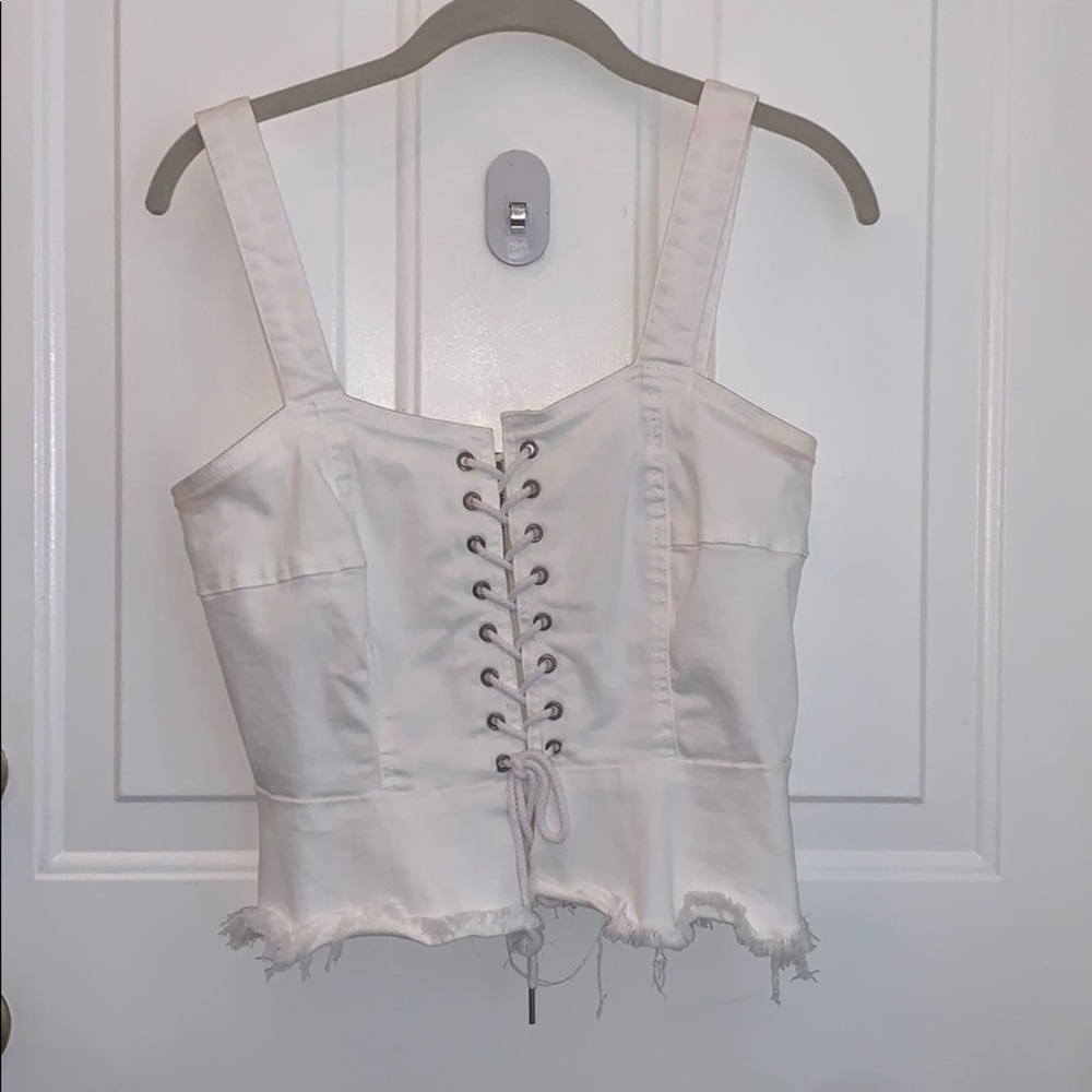 Blank NYC white denim lace up top. Never worn.